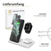 A white wireless charging station with a phone, smartwatch, and earbuds on it, along with a USB-C cable and packaging in the background. Produktbild-Vorschau