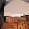 A close-up view of a cushion on a rattan chair, with a wooden floor visible below. Anteprima dell’immagine prodotto