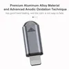 A close-up of a silver-colored mini remote control with a lightning connector. Produktbild-Vorschau