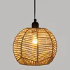 A close-up studio shot of a pendant lamp with a woven shade. Náhled obrázku produktu