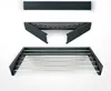 Three parts of a wall-mounted drying rack are displayed against a white background. Voir les images du produit