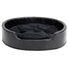 A black dog bed with a plush interior, shown from a slightly elevated front-facing angle against a white background. Produktbild-Vorschau