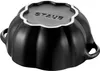 The underside of a black Staub cocotte is shown. Produktbild-Vorschau