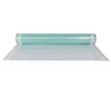 A roll of green mesh material with white edges, unrolling onto a white surface. Produktbild-Vorschau