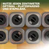 A top-down view of multiple stacked spice containers on a wooden surface. Produktbild-Vorschau