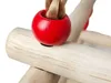 Close-up of a red bead on a wooden swing for children. Produktbild-Vorschau