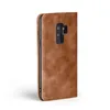 A brown leather flip case for a smartphone is shown from the side. Produktbild-Vorschau
