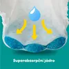 Close-up of a diaper showing its absorbent core with illustrative arrows and a water droplet icon. Náhled obrázku produktu