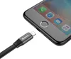 A close-up shot of a black Baseus charging cable being plugged into an iPhone. Anteprima dell’immagine prodotto
