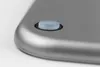 A close-up shot of a button on a gray kitchen scale. Anteprima dell’immagine prodotto
