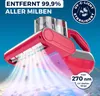 A red and gray handheld vacuum cleaner is shown in use, with purple and blue light beams emanating from it, suggesting sterilization. The background is a bright blue. Produktbild-Vorschau