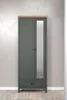 A tall, narrow wardrobe with two doors and a drawer at the bottom, set against a plain background. Podgląd zdjęcia produktu
