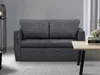 A dark gray sofa is shown in a room with a gray wall and a light gray carpet. Produktbild-Vorschau