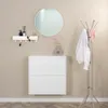 A hallway scene with a shoe cabinet, mirror, coat rack, and shelf. Produktbild-Vorschau