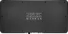 The bottom of a black electronic device with a logo. Produktbild-Vorschau