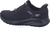 A black Skechers slip-on shoe is shown against a white background. Produktbild-Vorschau