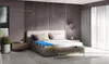 A bedroom scene with a cutaway view of a mattress. Produktbild-Vorschau
