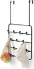 An over-the-door hook rack with multiple hooks, holding a mesh bag with fruit and a cap. Produktbild-Vorschau