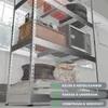 A metal shelving unit filled with various items, including storage boxes, pots, and bags of soil, in what appears to be a garage or storage room. Anteprima dell’immagine prodotto