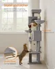 A multi-level cat tree with two cats interacting with it, placed in a room with a window. Produktbild-Vorschau