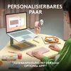 A person using a laptop, keyboard, and mouse on a desk, with headphones nearby. Produktbild-Vorschau