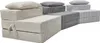 A modular guest mattress set with cushions, arranged in a curved line. Produktbild-Vorschau