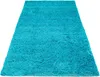 A shaggy rug is shown from a slightly elevated angle against a white background. Produktbild-Vorschau