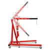 A red hydraulic engine crane is shown against a white background. The crane is in a partially extended position, with its boom angled upwards and outwards. The base of the crane has wheels for mobility. Anteprima dell’immagine prodotto