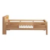 A side view of a wooden bed frame on a white background. Voir les images du produit
