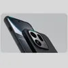 A close-up shot of a black phone case with a camera module, angled to show its texture and design. Produktbild-Vorschau