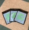 Three resealable plastic bags with a green graphic on a textured surface. Produktbild-Vorschau