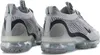 A pair of Nike Air Vapormax 2021 FK SE shoes shown from the back. Voir les images du produit