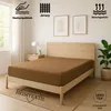 A bed with a brown fitted sheet is shown in a bedroom setting, with decorative elements and informational icons. Produktbild-Vorschau