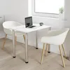 A white rectangular table with two white chairs and a laptop on it, placed in a bright room with a window. Produktbild-Vorschau