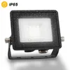 A black LED floodlight with water droplets on its surface, shown on a white background. Produktbild-Vorschau