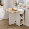 A foldable kitchen table with storage is shown in a kitchen setting. Voir les images du produit