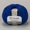A ball of blue yarn with a label attached. Produktbild-Vorschau