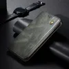 A close-up shot of a green leather flip wallet phone case, with a smartwatch in the background. Produktbild-Vorschau
