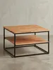 Quadratischer Couchtisch 60x60x41 cm mit massiver Akazienholzplatte und schwarzem Metallgestell, freigestellt auf weißem Hintergrund in der Frontalansicht._#sku_BARWL6.363# Produktbild-Vorschau