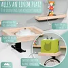 A display of a wooden shelf system designed for organizing children's toys and accessories, specifically for a Toniebox and its figures. Produktbild-Vorschau