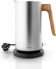 A silver electric kettle with a wooden handle sits on a black base, with a black power cord and plug visible. Anteprima dell’immagine prodotto