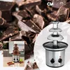 A chocolate fountain product collage with a large background image of chopped chocolate. Podgląd zdjęcia produktu