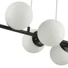 A close-up view of a black pendant light fixture with multiple white glass globe shades. Produktbild-Vorschau