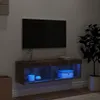 A TV stand with a TV mounted above it, in a room setting. Produktbild-Vorschau