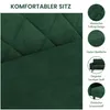 Close-up view of a green velvet sofa with details. Produktbild-Vorschau