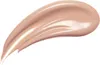 A swatch of liquid foundation or concealer is shown against a white background. Produktbild-Vorschau