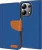 A blue flip case for a smartphone, with a brown leather strap closure and a small logo on the bottom left. Podgląd zdjęcia produktu