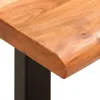 Close-up of the edge of a wooden table with a black metal leg. Náhled obrázku produktu