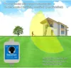 An illustration showing a Deramax-Bird device mounted on a house, emitting ultrasonic waves to cover an area of a garden and house exterior. A person is shown mowing the lawn within the coverage area. Anteprima dell’immagine prodotto