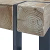 Close-up view of a wooden table with metal legs. Voir les images du produit